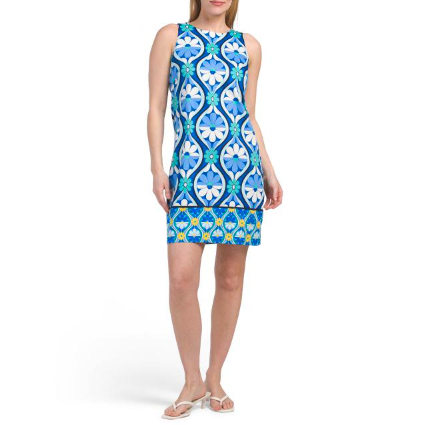 Effortless elegance meets everyday comfort in this London Times mini shift dress. Featuring a vibrant floral print on a soft cotton-spandex blend, this sleeveless design offers gentle stretch for all-day wear. The classic round neckline and contrast hem create a polished look, while the back zip closure ensures a secure fit. At approximately 36 inches long, it's the perfect length for a modern, playful silhouette.&nbsp;