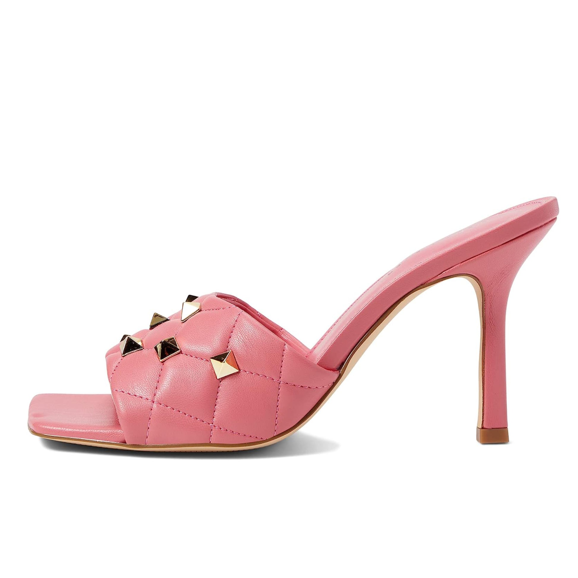 Add an elegant touch to your look with the Studded Heels from Marc Fisher. Featuring a luxurious quilted band adorned with gold-tone studs, these open-toe sandals deliver sophisticated elegance for any occasion. The 4-inch stiletto heel and slide-on design offer both glamour and comfort, while the square toe silhouette adds modern flair. Pairs well with formal and casual outfits.