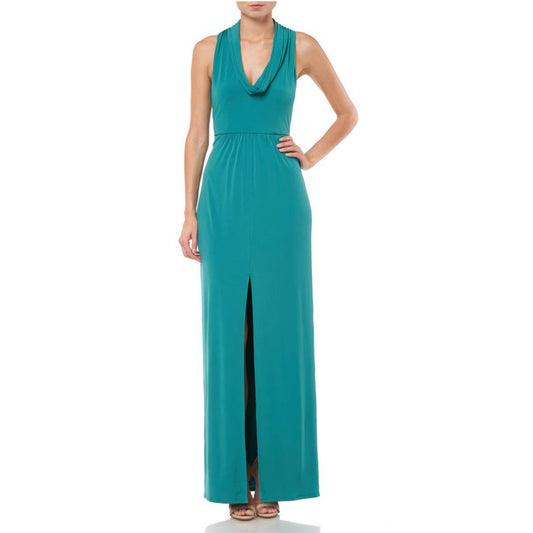 A green maxi dress with a cowl neckline and front slit, featuring a waist tie and a back zip closure, taken from the back showing the dress's full length.