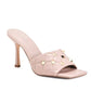 Add an elegant touch to your look with the Studded Heels from Marc Fisher. Featuring a luxurious quilted band adorned with gold-tone studs, these open-toe sandals deliver sophisticated elegance for any occasion. The 4-inch stiletto heel and slide-on design offer both glamour and comfort, while the square toe silhouette adds modern flair. Pairs well with formal and casual outfits.